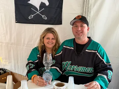 Amanda & Jarrett showing off the hardware from winning at SiNaCa Pride of Southside
